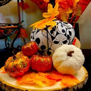 Handmade jack skeleton pumpkin on larg round wood